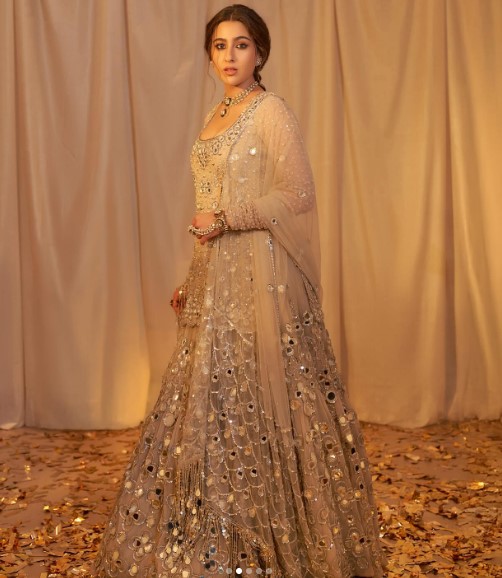 Golden Miroor Lehnga
Golden Mirror Sharara
Pakistani Maharani Lehenga