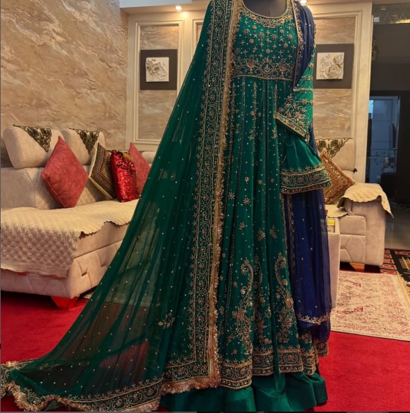 Green anarkali
Wedding golden embroidery