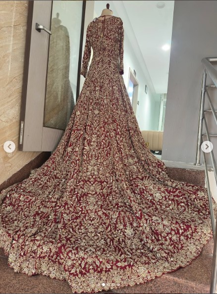 Designer maroon wedding gown for Walima and reception
Luxury Pakistani bridal couture with heavy embroidery