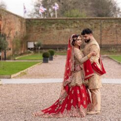 Designer Golden Peplum with Red Long Trail Lehenga and Embellishment - DN-1521